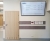 Monitor-z-tablica-lekarzy-w-przychodni-lekarskiej-qcloud-scaled.jpg